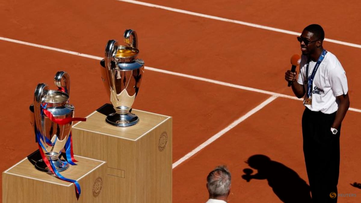 PSG players celebrate Champions League back-to-back titles with French Open crowd