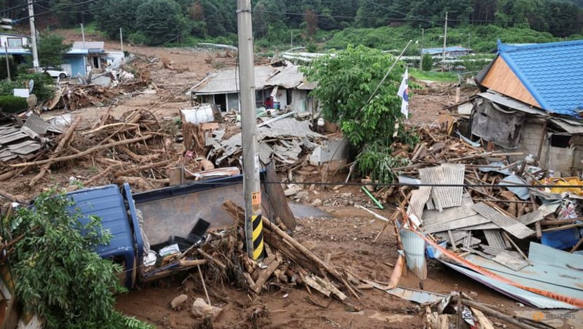 Torrential rain leaves at least 18 dead in South Korea, trail of devastation Torrential rain leaves at least 18 dead in South Korea, trail of devastation