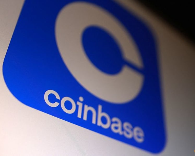 Coinbase posts surprise loss on crypto trading slowdown