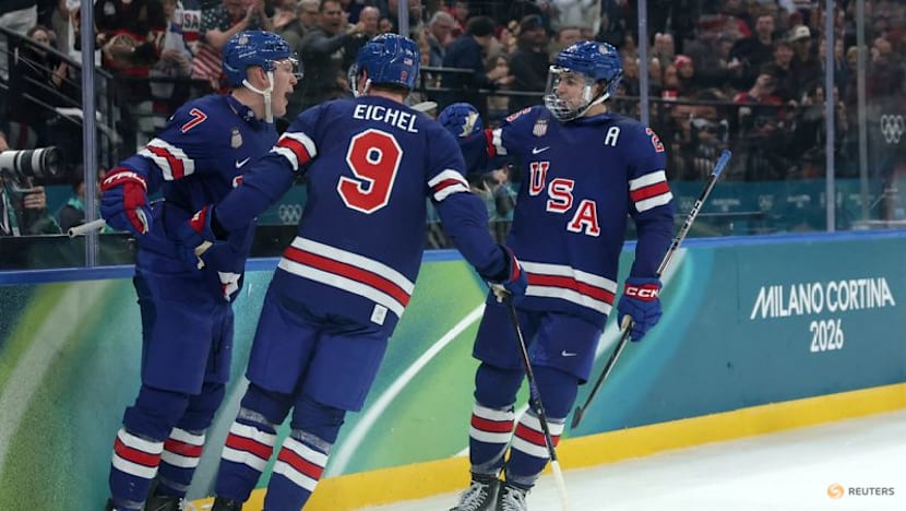 Ice hockey-Slovakia win group, US beat Denmark, Finland, Latvia notch wins