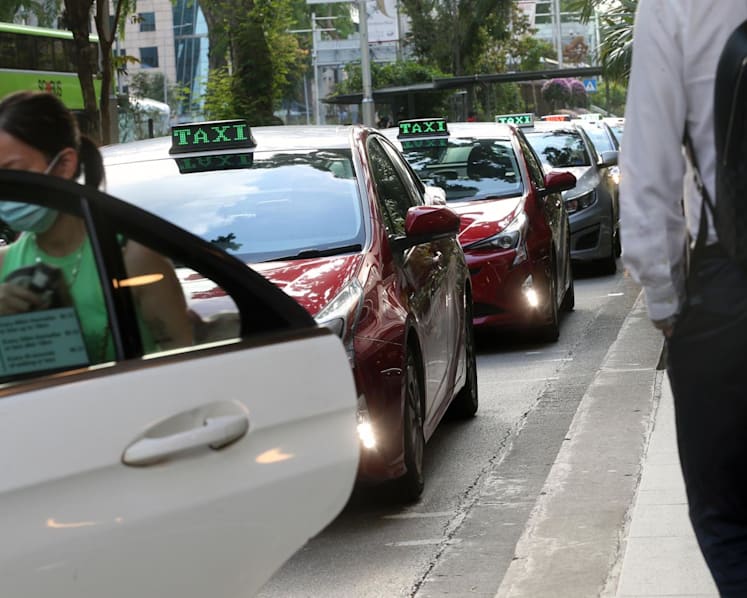 Explainer: Should street-hail taxi platforms, logistics companies be included under new measures to protect gig workers' welfare?