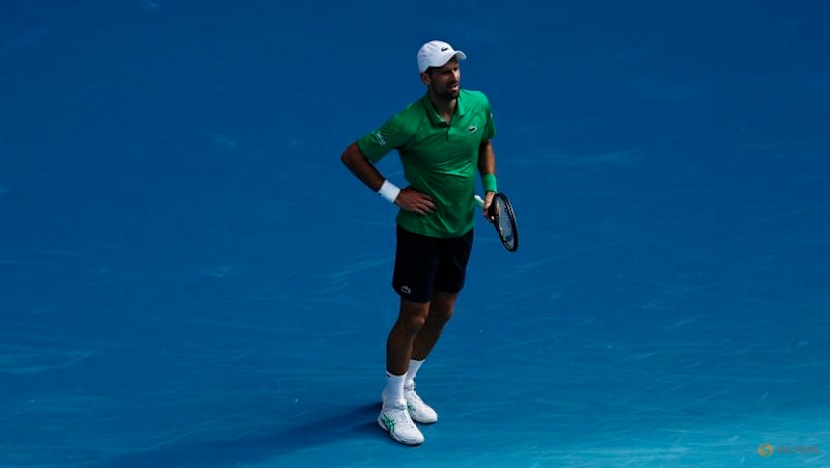 Djokovic gets out of jail and into Melbourne semis as injured Musetti forced to retire