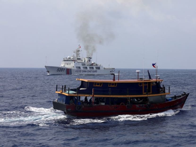 A Philippine supply boat sails near a Chinese Coast Guard ship during a resupply mission for Filipino troops stationed at a grounded warship in the South China Sea, Oct 4, 2023. A Philippine supply boat sails near a Chinese Coast Guard ship during a resupply mission for Filipino troops stationed at a grounded warship in the South China Sea, Oct 4, 2023.