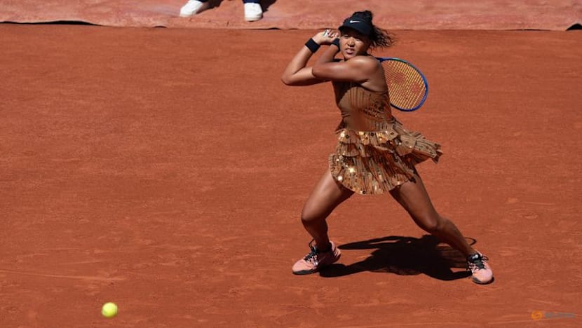 Osaka embracing role as entertainer after another grand walk-on