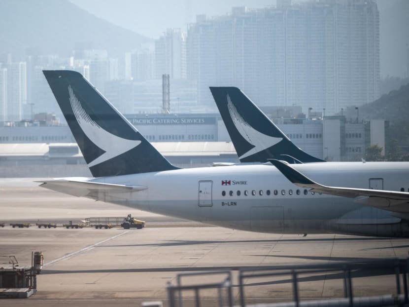 Cathay Pacific airplanes are pictured at the Hong Kong International Airport on December 28, 2022.