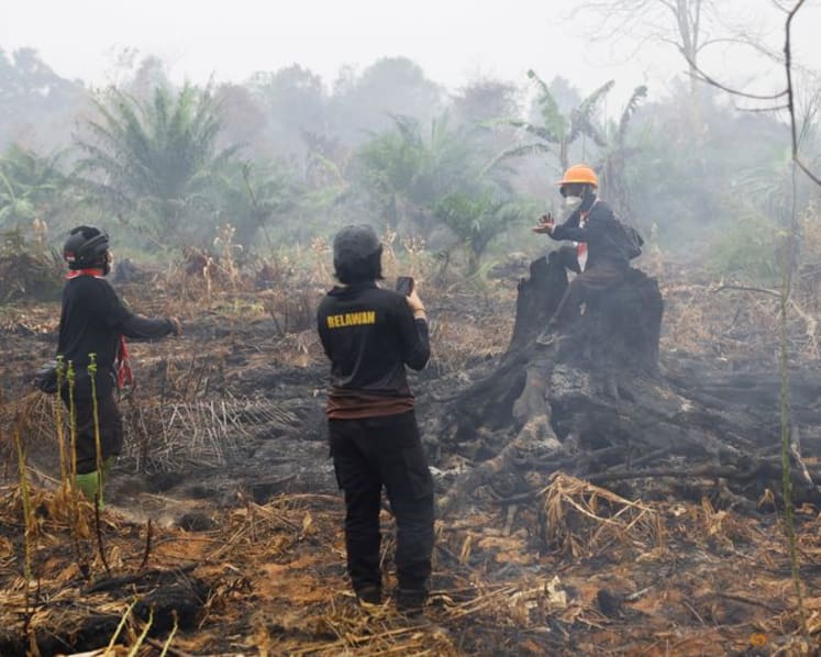 Indonesia's wildfires may last until early November, minister says