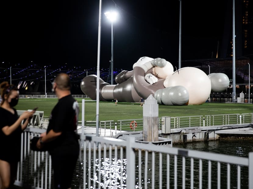 The Kaws:Holiday Singapore exhibition at the Float@Marina Bay on display in November 2021.