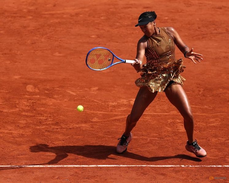 Gold-sequined Osaka survives three-set scare against teenager Jovic