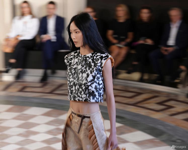 At Vuitton, the Louvre is a stage for stars, spectacle and Paris Fashion Week's moving masterpiece