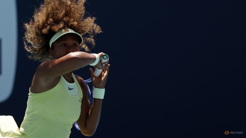 Osaka battles back to advance in Miami