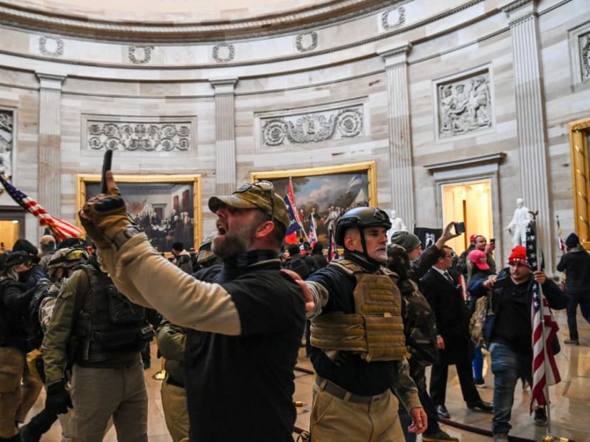 Supporters of US president Donald Trump enter the US Capitol's Rotunda on Jan 6, 2021, in Washington, DC.