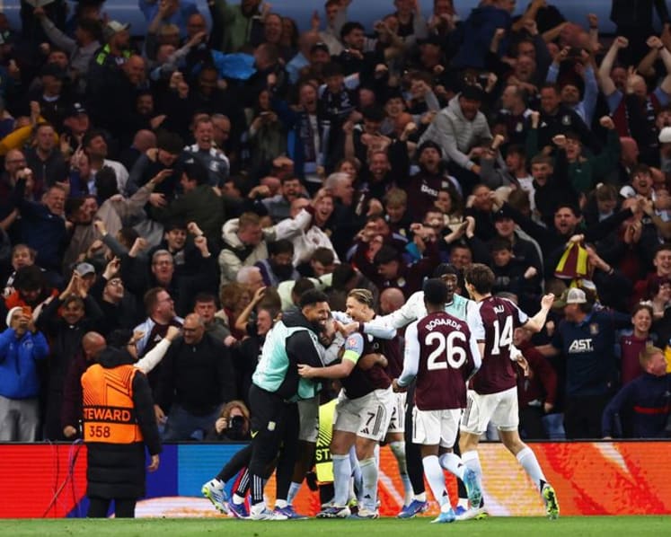 McGinn double helps Villa crush Forest 4-0 to reach Europa League final