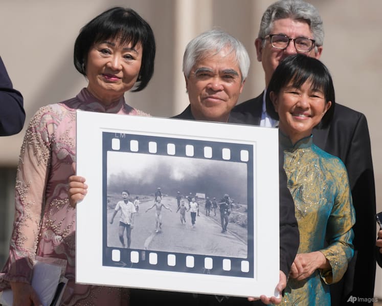 Photo group says it has 'suspended attribution' of historic Vietnam picture because of doubts