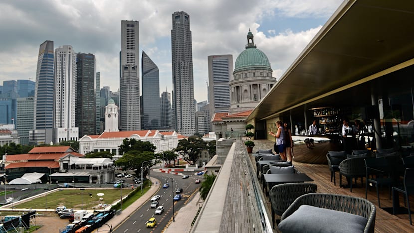 Q3 GDP growth beats estimates, but 2015 forecast cut to nearly 2%