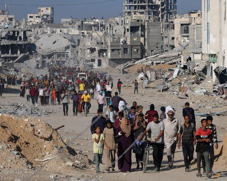 Gazans stream back home as Israel-Hamas ceasefire holds