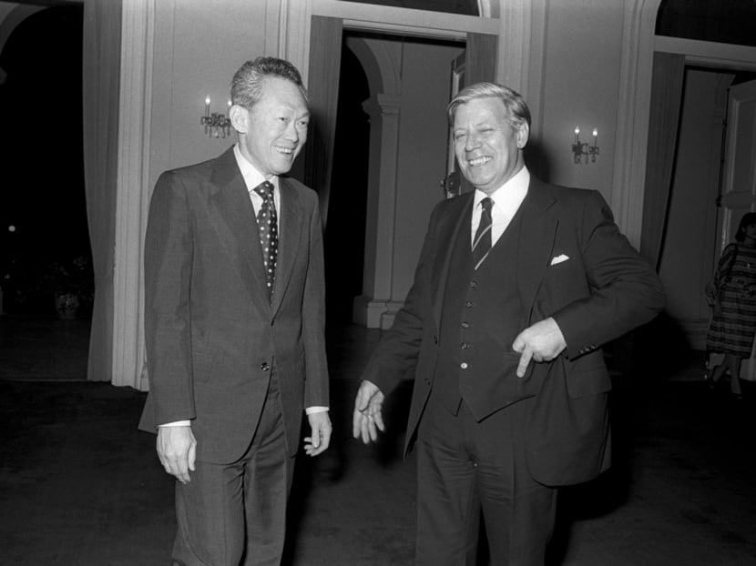 Then Prime Minister Mr Lee Kuan Yew sharing a lighter moment with then West German Chancellor Helmut Schmidt, his guest of honour for dinner at the Istana. The Chancellor was on a two-day state visit to Singapore in 1978. photo: National Archives Of Singapore