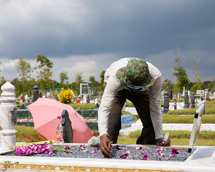 Covid-19 took away his earnings, but one man found a new way to work at cemeteries this Hari Raya Puasa