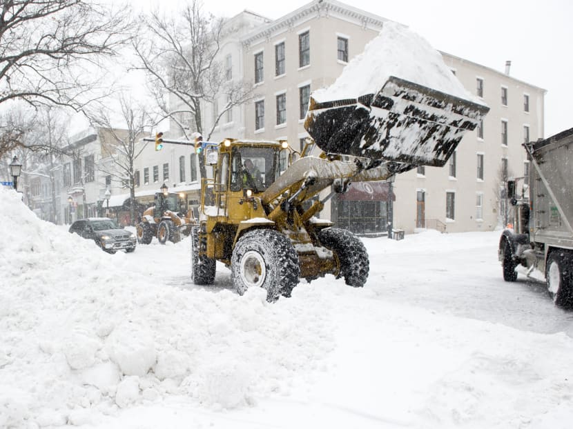 A blizzard with hurricane-force winds brought much of the US East Coast to a standstill yesterday (Jan 23). Photo: AP