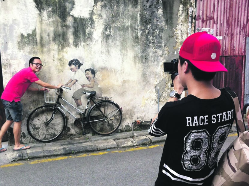 The good, bad and ugly of street artist Ernest Zacharevic’s murals