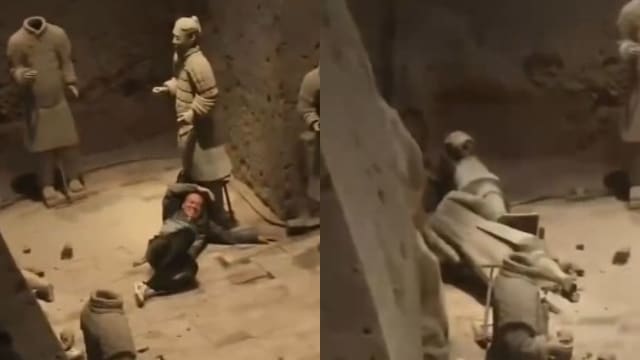 男子参观兵马俑时跳入坑 两尊铠甲武士俑损坏