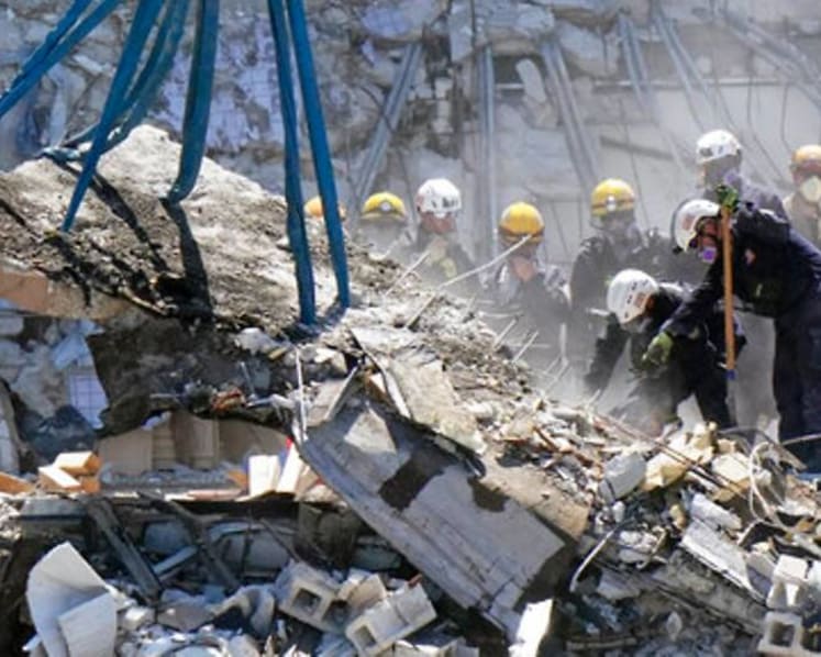 Tunnelling Florida rescuers spot voids, search for survivors in Miami condo rubble