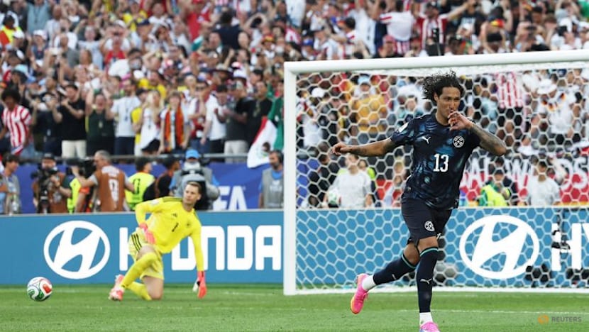 Paraguay stun Germany on penalties to reach World Cup last 16