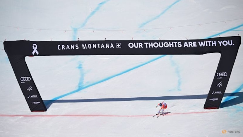 Alpine skiing-Von Allmen heads to Olympics with a win, Odermatt fourth