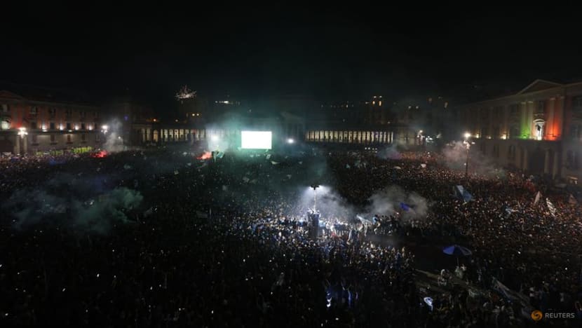Euphoric Napoli fans flood streets for champions tour by land and sea Euphoric Napoli fans flood streets for champions tour by land and sea
