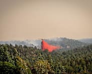 Fire in southwestern Spain active as 470 moved to safety