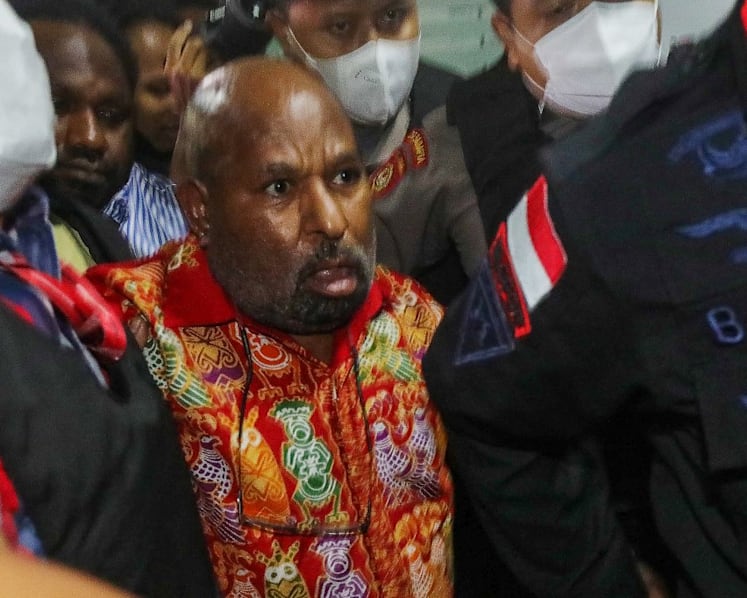 Former Papua governor's death while serving time for corruption sparks criticism against beleaguered anti-graft agency