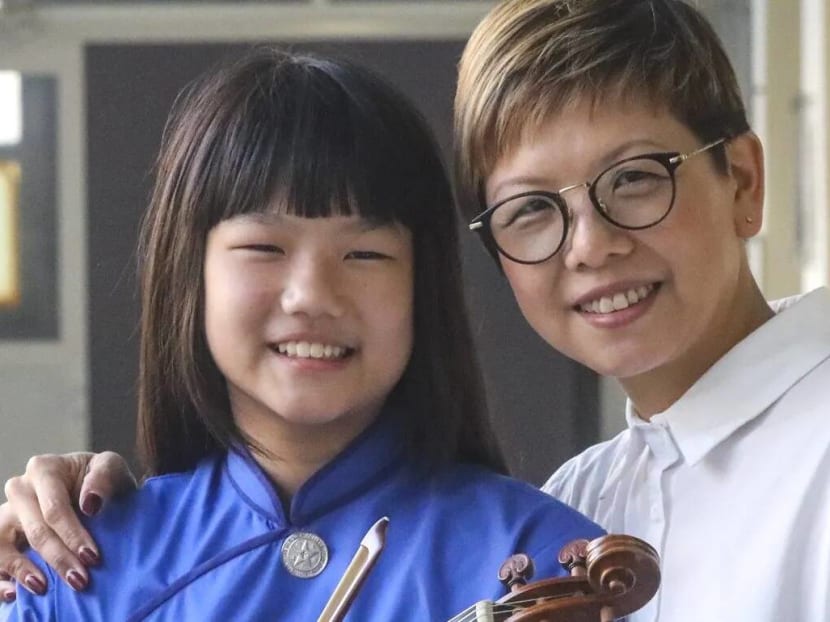 Jesse's mother Ms Yonnie Wong (right) said her daughter (left) has “has this unrelenting spirit”.