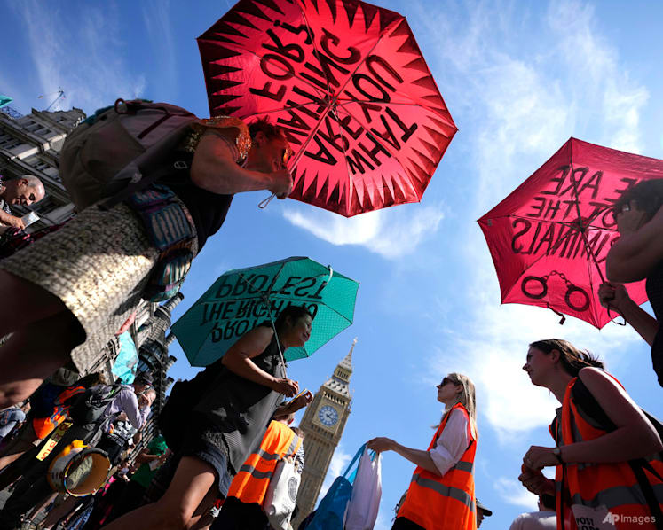 Protesters in UK decry climate change after record heatwave