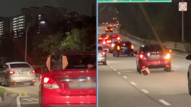 糊涂司机袋子放后车厢上直接开车 物品散落马路