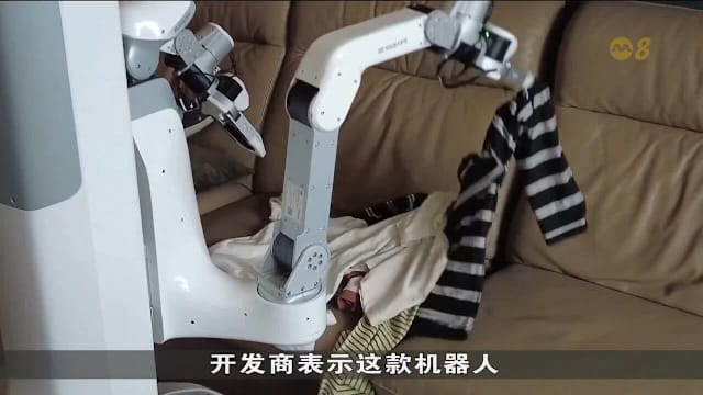 中国推出家务机器人 用户可通过手机预约打扫服务
