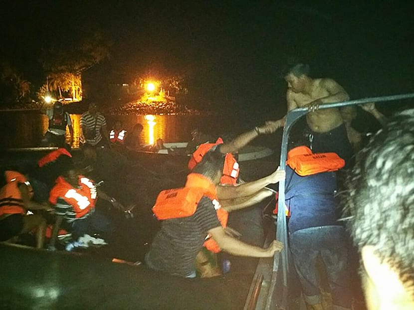 Passengers being evacuated from the Batam ferry. All passengers and crew made it to Batam shores at around 10.10pm on Sunday. Photo: Chella Ho