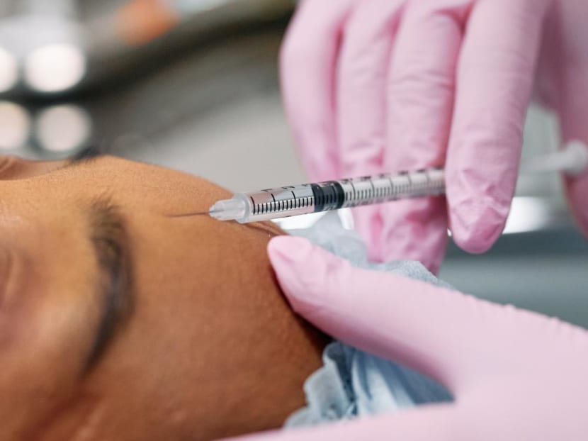 A person receiving an injection. 
