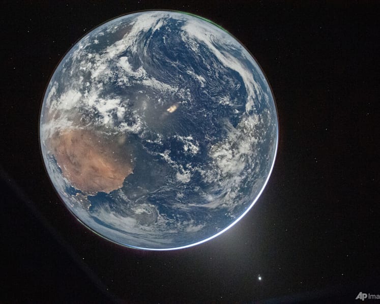 Artemis astronauts more than halfway to Moon, putting Earth in rearview