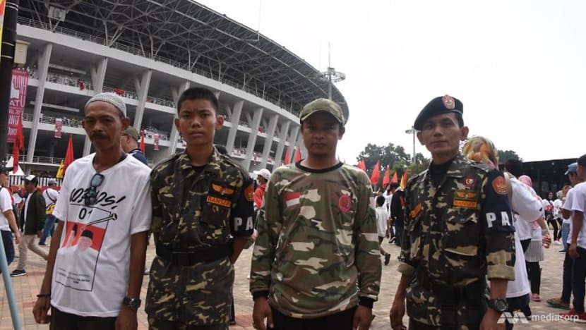 Election enforcers: Paramilitary groups for Jokowi and Prabowo flex their muscles at rallies Election enforcers: Paramilitary groups for Jokowi and Prabowo flex their muscles at rallies