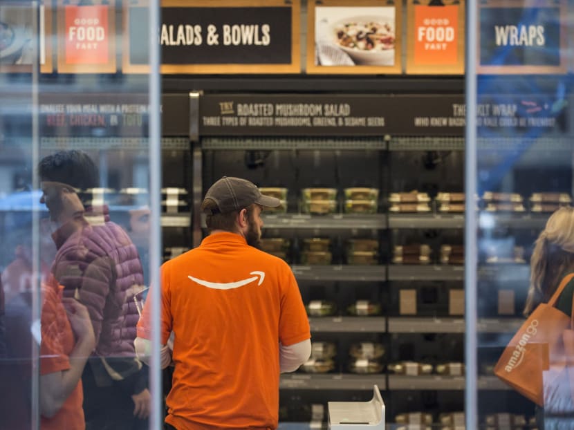 An Amazon employee at work in the Amazon Go grocery store in Seattle, on Dec 5, 2016. Photo: The New York Times