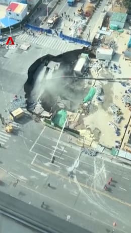 Sinkhole swallows part of metro construction site in Shanghai