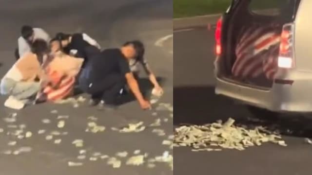 中国汽车后门突然打开 大量纸币从车后掉落