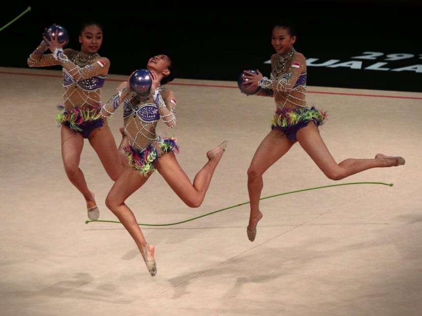 Singapore competes in the SEA Games rhythmic gymnastics group mixed apparatus (2 ropes, 3 balls) on 28 August, 2017. Photo: Jason Quah/TODAY