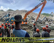 Death toll climbs after trash site collapse buries dozens in Philippines