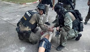 Gunman detained after entering southern Thai school, hostages freed, police official says