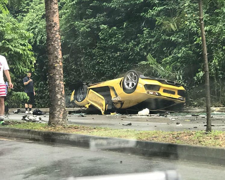Lamborghini driver, 22, in hospital after car flips over in Sentosa
