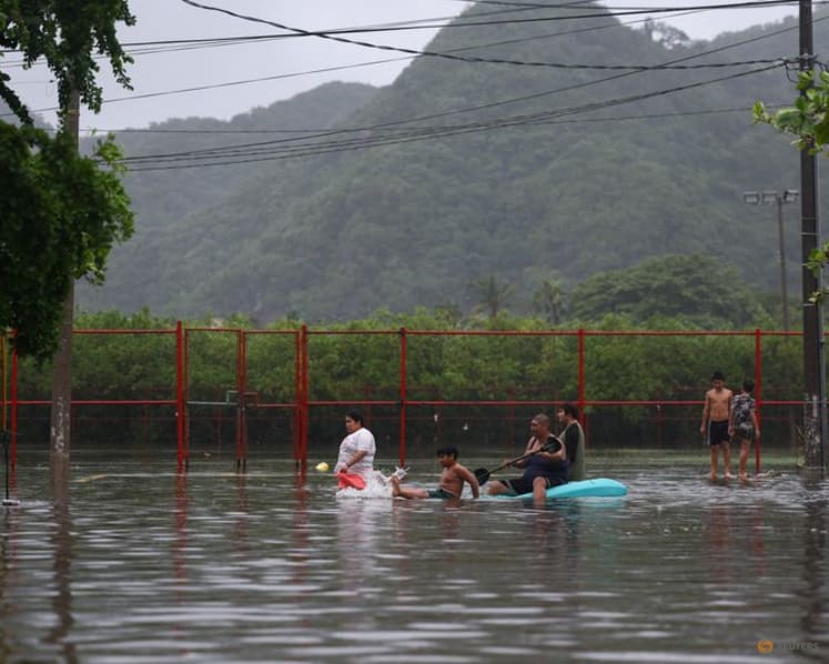 Hurricane Simon weakens to Category 3 as rains flood Mexico's Pacific coast 
