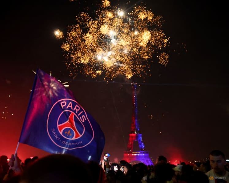 Jubilant PSG supporters spill onto Paris streets, some clashes with police