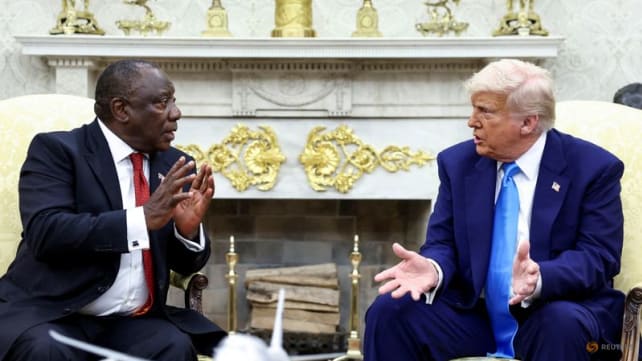 Trump challenges South Africa's president on White House trip, with white farmer murder claims