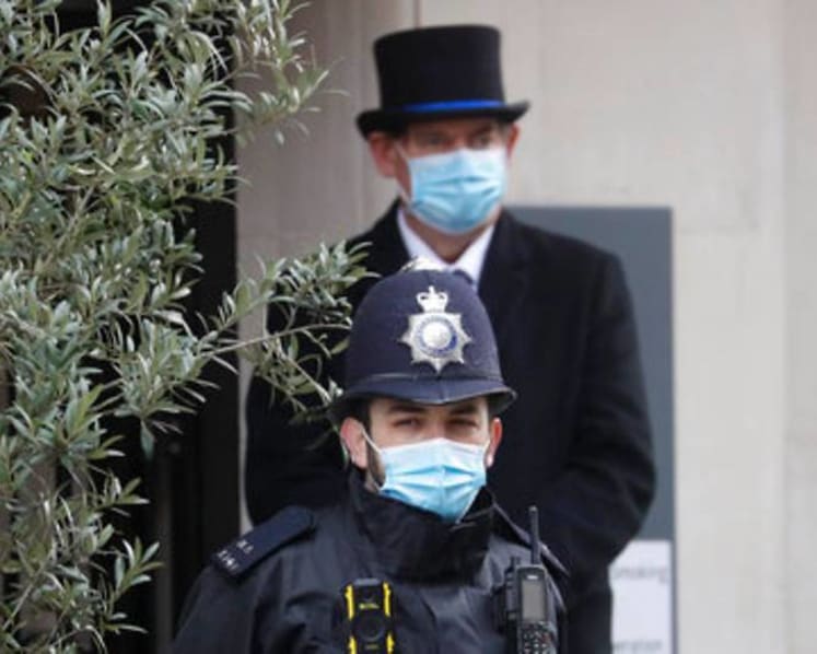 Britain's Prince Philip remains in hospital as 'precaution'