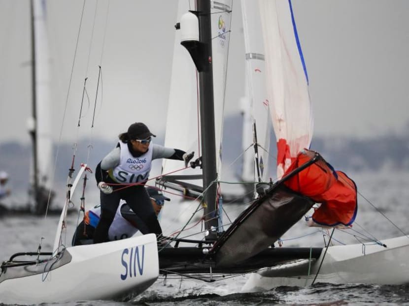 Singapore's Denise Lim (foreground) and Justin Liu competing in the Nacra 17 mixed at the Marina de Gloria. Photo: Reuters
